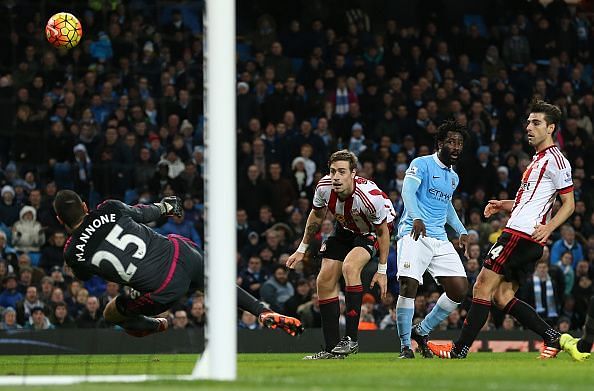 Bony watches Mannone attempt a save for Sunderland